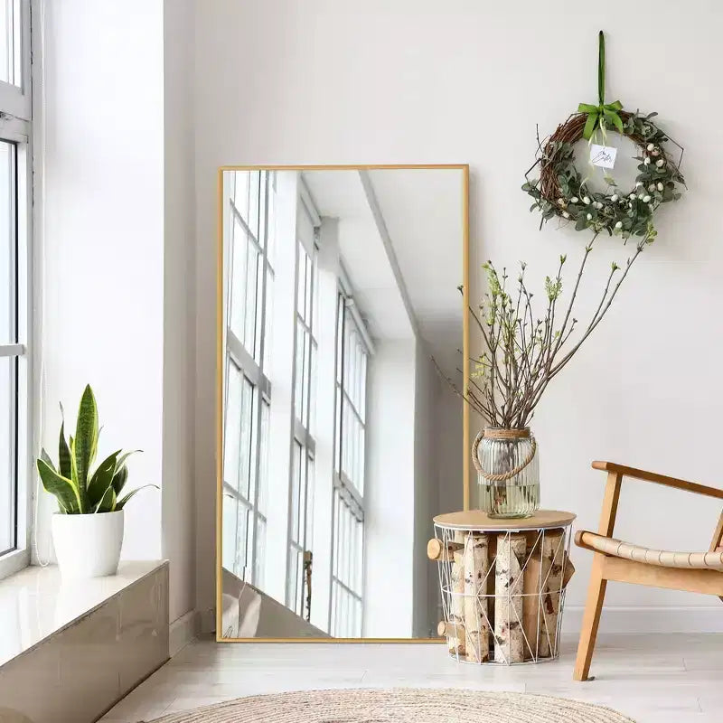 35 in. W x 59 in. H Rectangular Metal Framed Wall Mirror in Gold